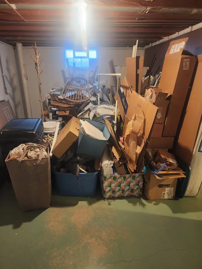 Roll-off dumpster container at job site for 4 Yard Dumpster Rental in Center